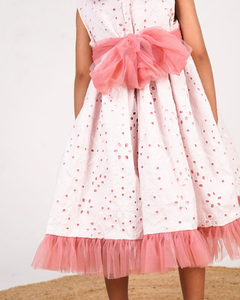 Faye Blush Eyelet Net Peep Out Dress with net frills and a floral bloom.