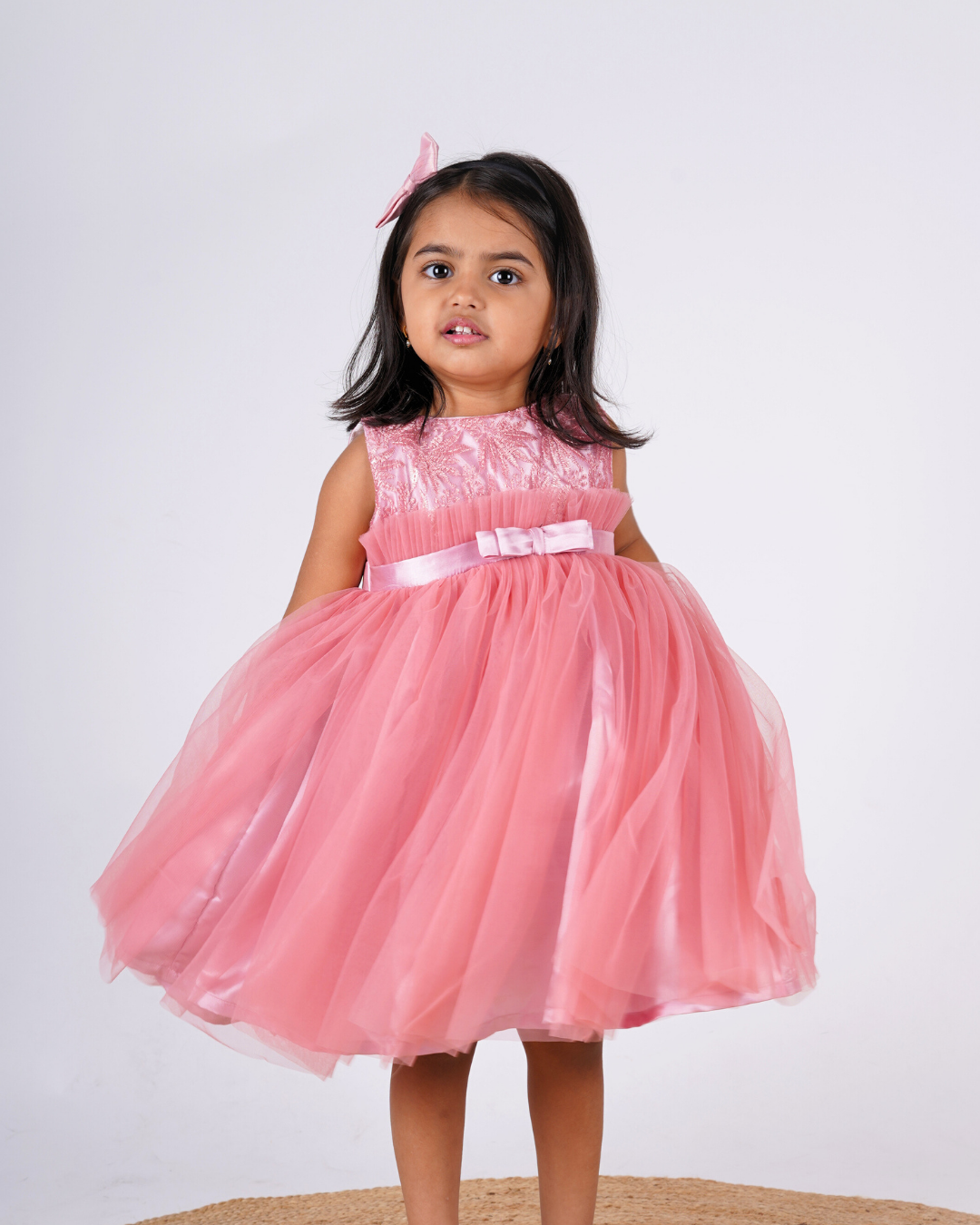 Faye Blush Pink Frill Dress with an embroidered bodice