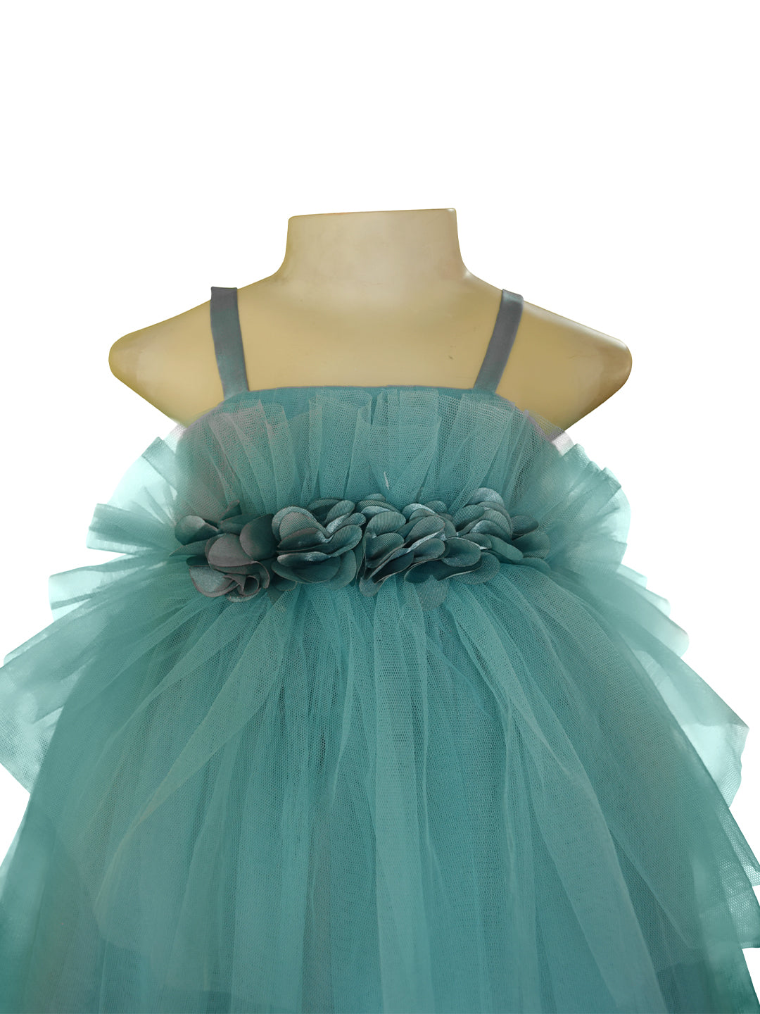 A strappy dress in Agean Teal green colour made of net gathered at the waist with flowers 