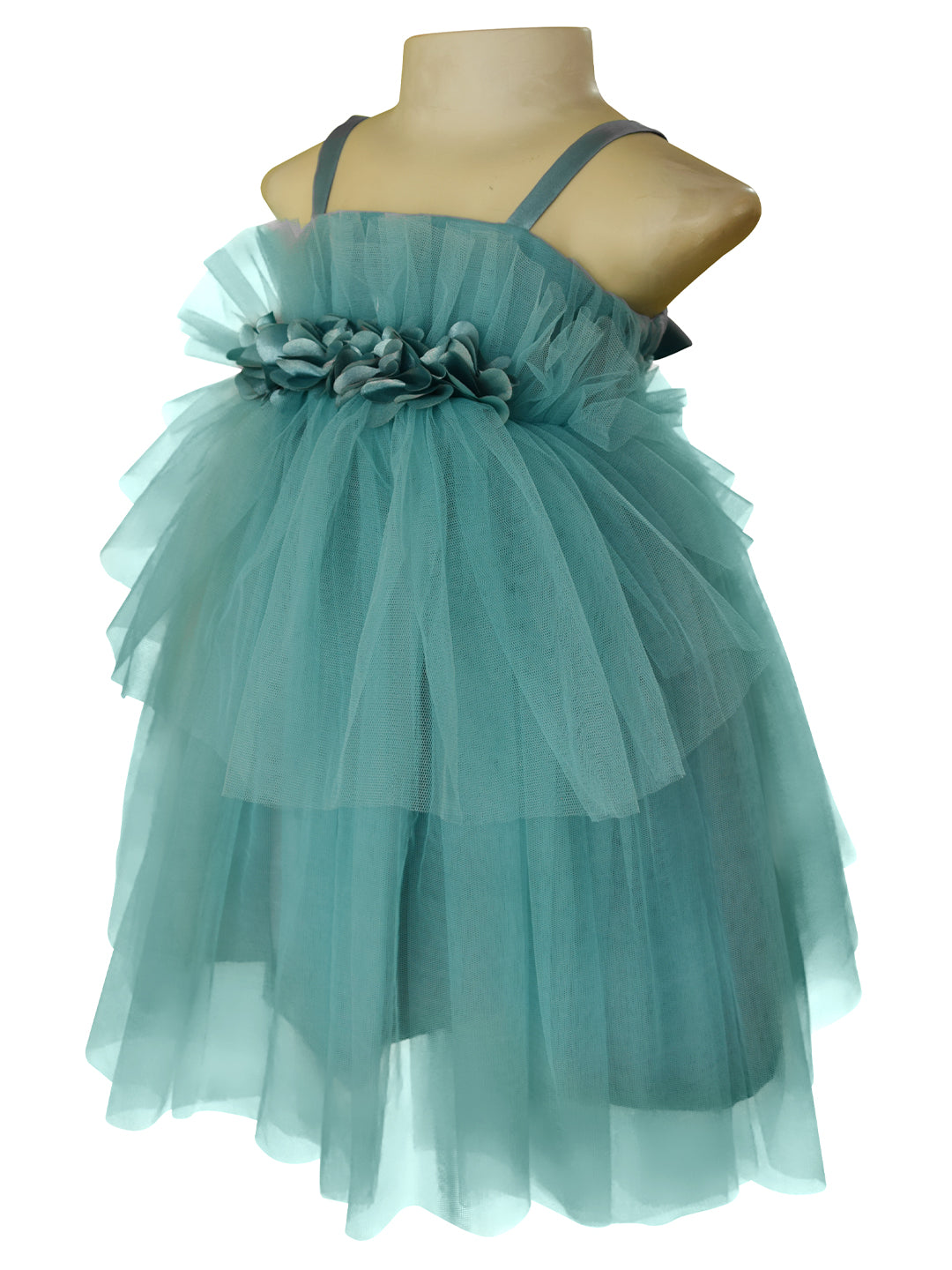 A dress made of teal green colour tule for little girls from Faye. This strappy dress is gathered at the waist with matching satin flowers 