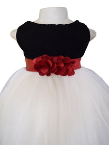 A baby girls dress in Black Velvet & Ivory net with Maroon satin sash and flowers