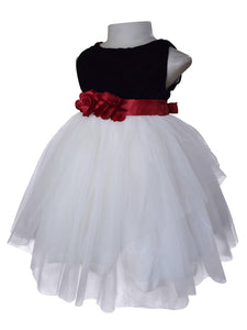 A dress for little girls featuring a black velvet bodice & Ivory net skirt with Maroon satin sash and flowers