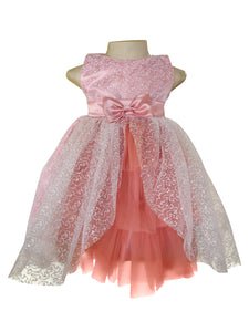 A pink sleeveless children's party dress. The dress has a textured pink bodice with a matching satin bow at the waist, layered tulle, and a sheer floral lace overlay.