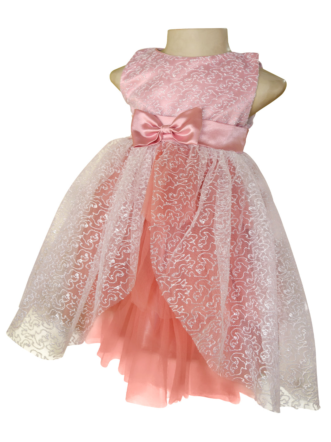 A pink sleeveless children's party dress. The dress has an embroidered net bodice with a satin sash & bow at the waist, layered tulle