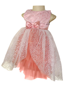 A pink sleeveless children's party dress. The dress has an embroidered net bodice with a satin sash & bow at the waist, layered tulle
