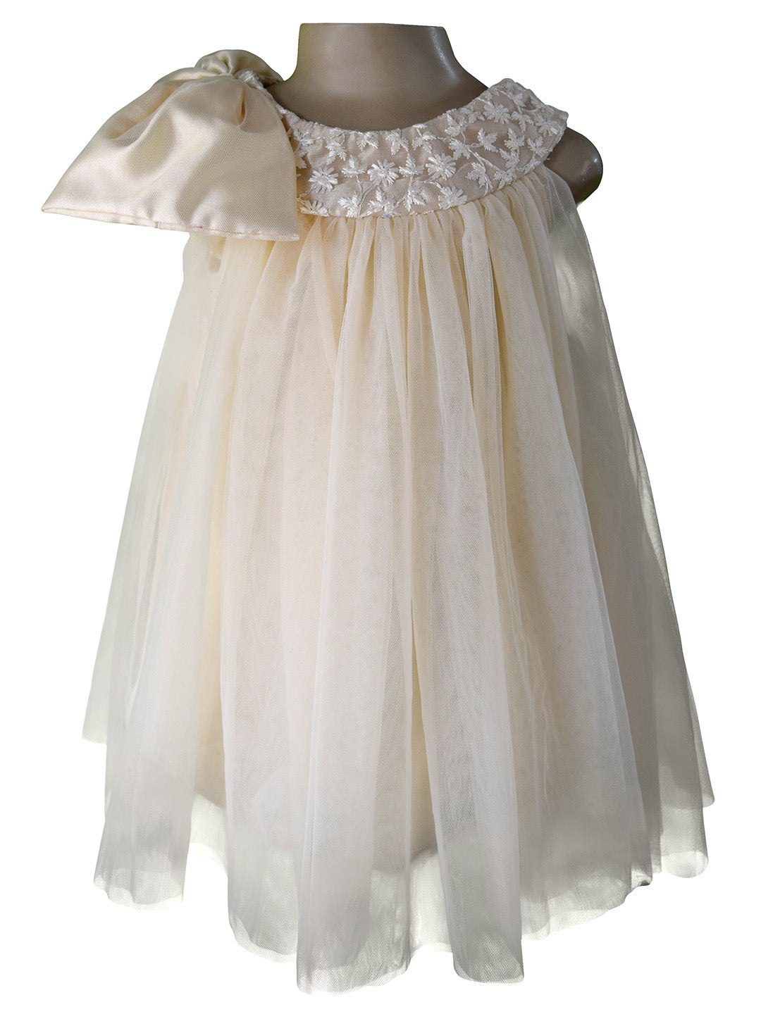 Faye Champagne Lace-Net Swing Dress with oversized bow.