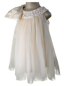 Faye Champagne Lace-Net Swing Dress with oversized bow.