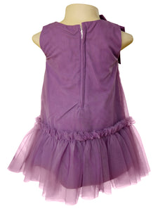 A Lavender Net kids dress with a low waist and a bow on the shoulder