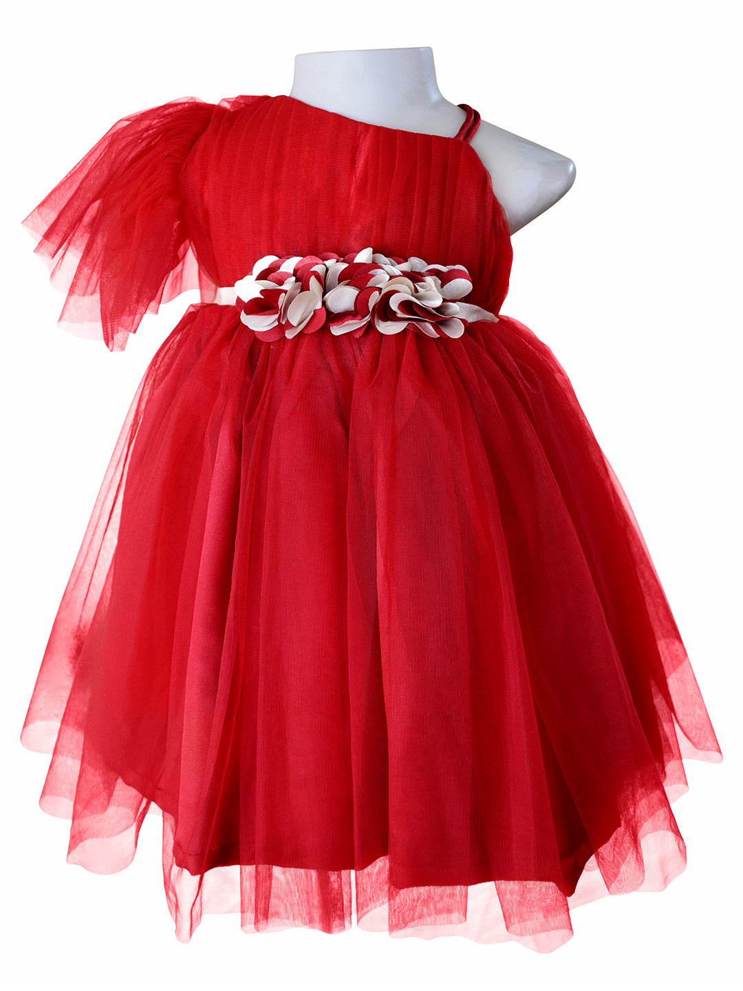 A party dress for girls form Faye. This maroon dress features one shoulder with statin straps and the other with net frills. Banded at waist with gold and maroon satin flowers