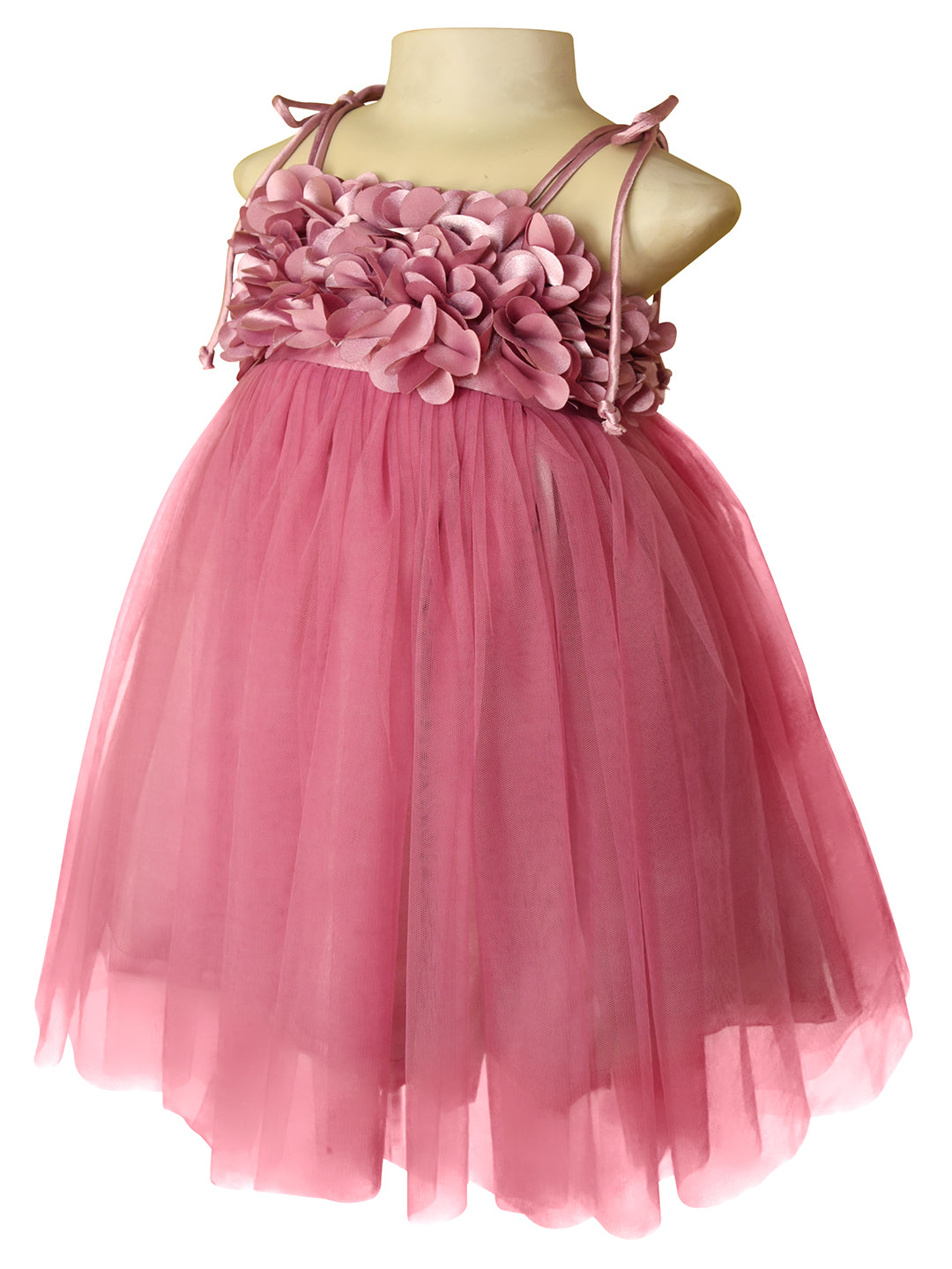 A mauve pink girls' party dress displayed on a mannequin against a plain white background. The dress has a ruffled floral bodice with thin shoulder straps and a full layered tulle skirt.