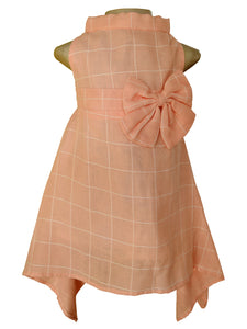 Peach high neck dress with cream checks featuring an empire waistline and an oversized bow
on the side. 