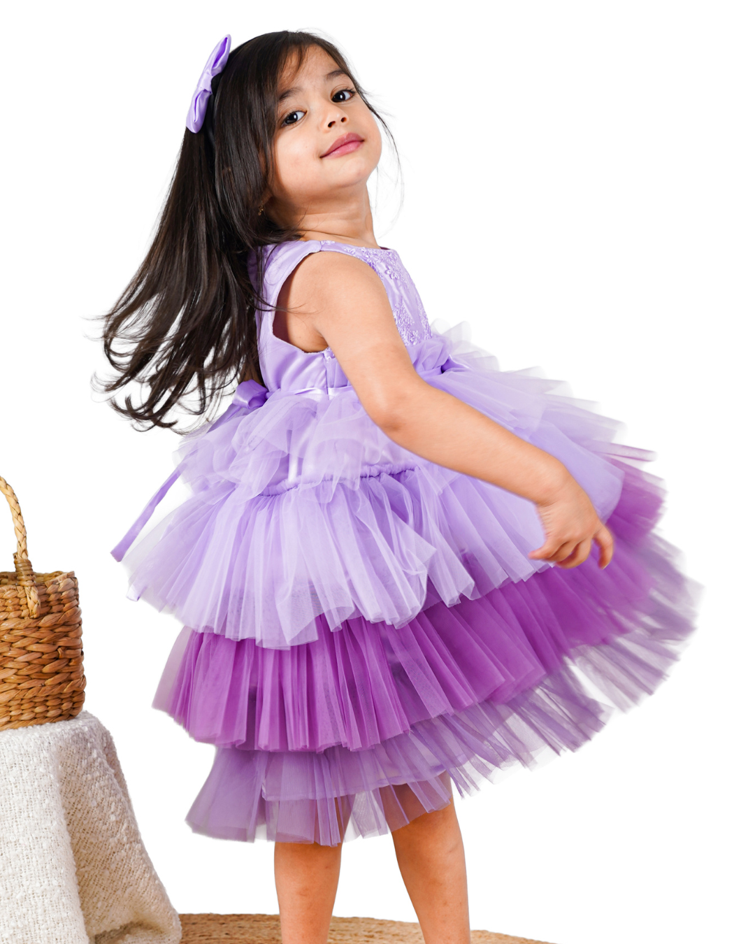 Young girl wearing the Faye Lilac Embroidered Tiered Ombre Dress 