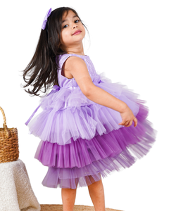 Young girl wearing the Faye Lilac Embroidered Tiered Ombre Dress 