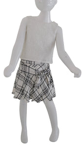 Faye Black & Ivory Kids Skirt with Checks print on a mannequin